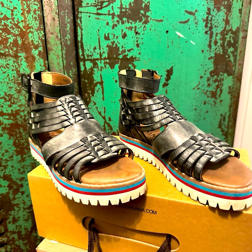 Roan sandals size 7.